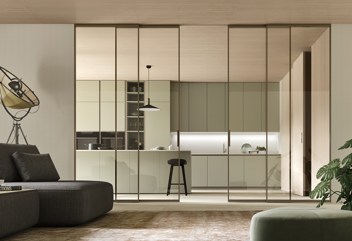 Porte a vetro scorrevoli con sistema Skyline Slide per dividere cucina e soggiorno